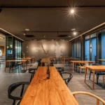 Tables and seating in the Monkey Hub workspace at Blu Monkey Bangtao