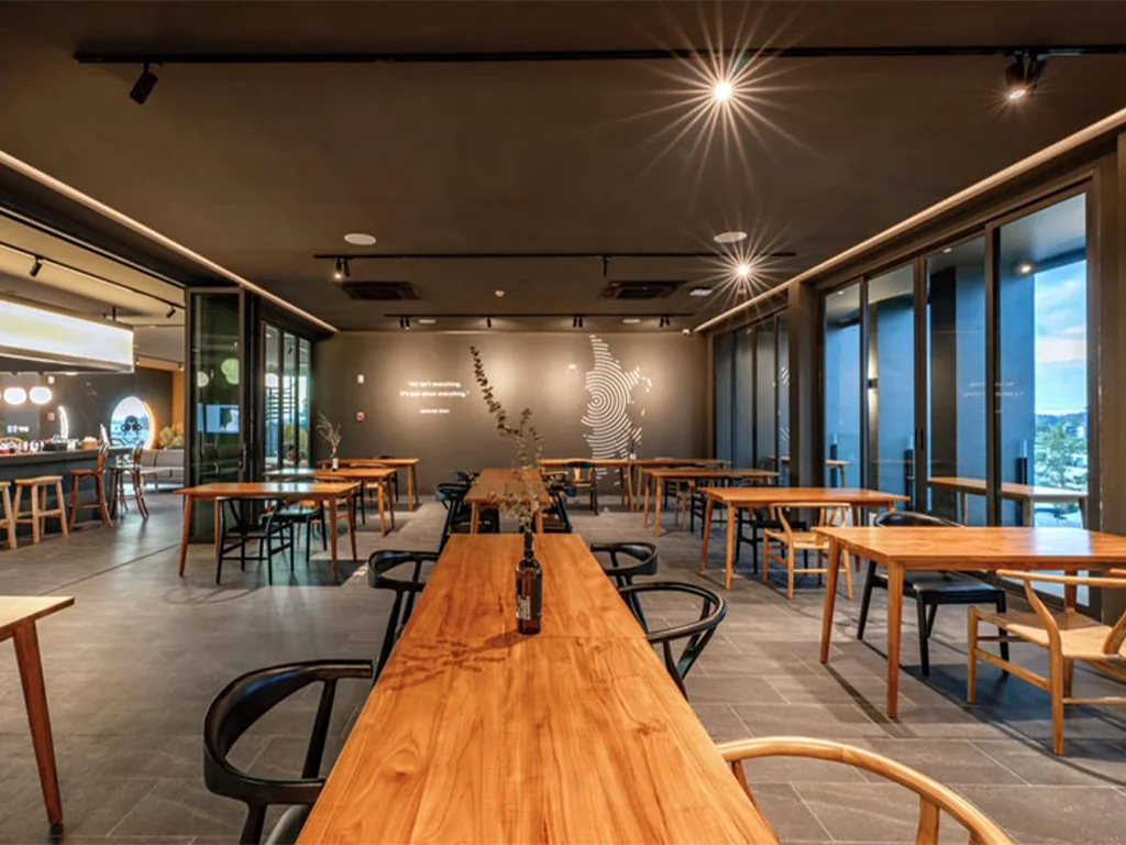 Tables and seating in the Monkey Hub workspace at Blu Monkey Bangtao
